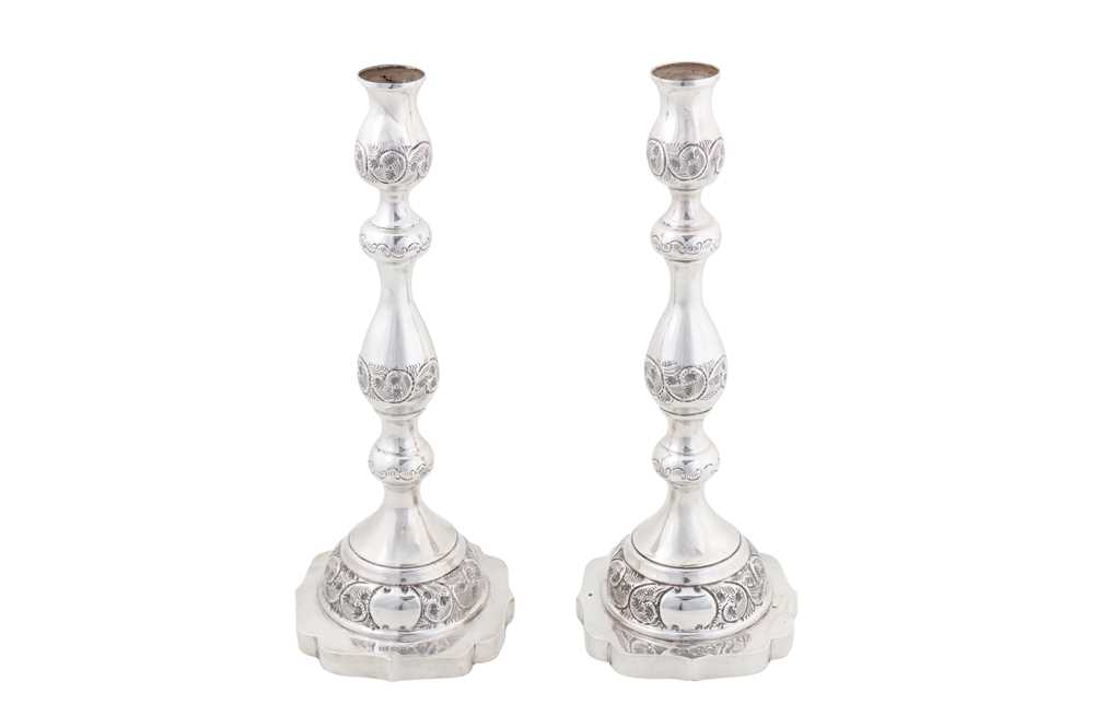 Lot 195 - JUDAICA - A PAIR OF GEORGE VI STERLING SILVER SABBATH CANDLESTICKS, LONDON 1942 BY R.S