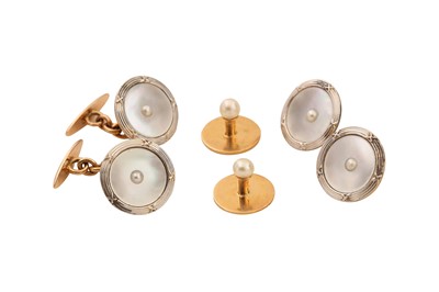 Lot 509 - A SET OF MOTHER-OF-PEARL DRESS STUDS