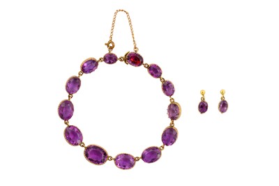 Lot 84 - AN AMETHYST BRACELET AND EARRING SUITE