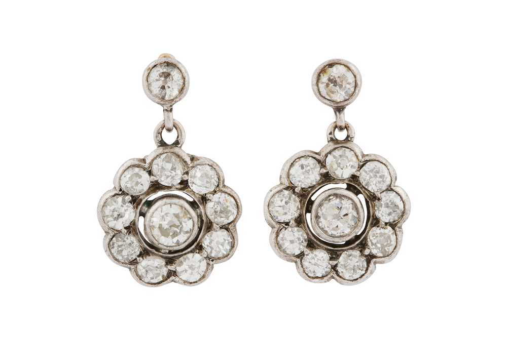 Lot 65 - A PAIR OF DIAMOND CLUSTER EARRINGS