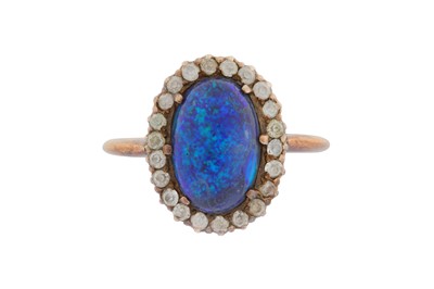 Lot 114 - A BLACK OPAL AND WHITE SAPPHIRE CLUSTER RING
