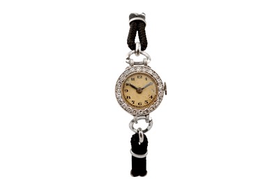 Lot 496 - GEM-SET COCKTAIL WATCH - PLATINUM