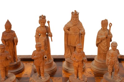 Lot 280 - A FINE SET OF CHARLEMAGNE TYPE CARVED LIME WOOD CHESSMEN, GERMAN/SWISS LATE 19TH CENTURY