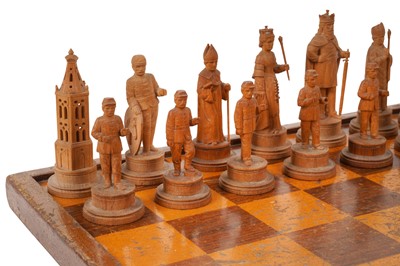 Lot 280 - A FINE SET OF CHARLEMAGNE TYPE CARVED LIME WOOD CHESSMEN, GERMAN/SWISS LATE 19TH CENTURY