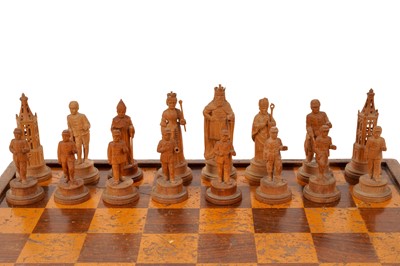 Lot 280 - A FINE SET OF CHARLEMAGNE TYPE CARVED LIME WOOD CHESSMEN, GERMAN/SWISS LATE 19TH CENTURY