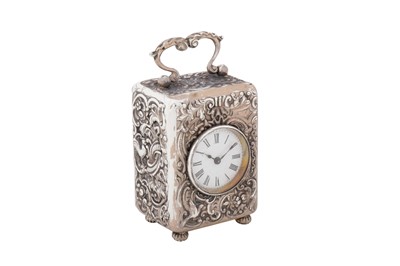 Lot 139 - A Victorian sterling silver small traveling time piece or clock, London 1892 by William Comyns