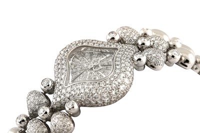 Lot 464 - CHOPARD PUSHKIN BRACELET WATCH - 18K WHITE GOLD AND DIAMONDS