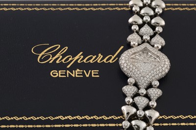 Lot 464 - CHOPARD PUSHKIN BRACELET WATCH - 18K WHITE GOLD AND DIAMONDS