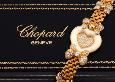 Lot 469 - CHOPARD CREATION 'HEART' BRACELET WATCH - 18K GOLD AND DIAMONDS