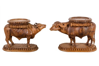 Lot 50 - A PAIR OF ANGLO INDIAN CARVED STANDS