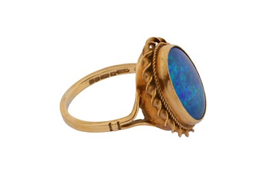 Lot 116 - A BLACK OPAL TRIPLET RING