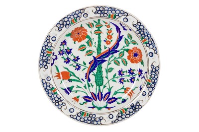 Lot 53 - AN IZNIK CHARGER WITH CENTRAL SAZ LEAF