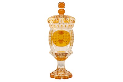 Lot 226 - A BOHEMIAN AMBER-STAINED GOBLET AND CROWN COVER, CIRCA 1850