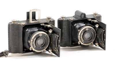 Lot 128 - A Pair of Voigtlander Folding Perkeo Cameras with Heliar Lenses.
