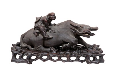 Lot 689 - A CHINESE WOOD CARVING OF A WATER BUFFALO AND BOY