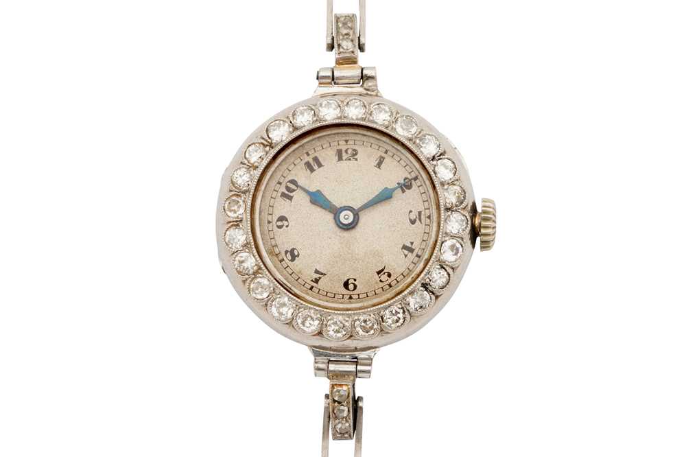 Lot 267 - A LADY'S PLATINUM AND DIAMOND COCKTAIL WATCH