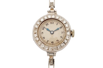 Lot 267 - A LADY'S PLATINUM AND DIAMOND COCKTAIL WATCH