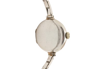 Lot 267 - A LADY'S PLATINUM AND DIAMOND COCKTAIL WATCH