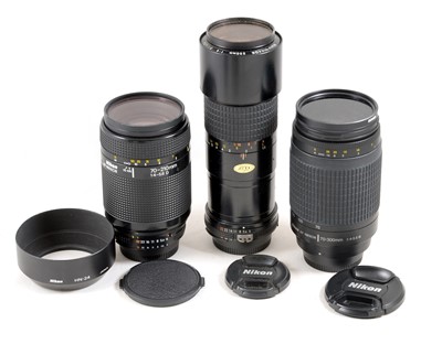 Lot 1081 - Two Nikon AF Zoom Lenses and a 200mm Ais Telephoto.