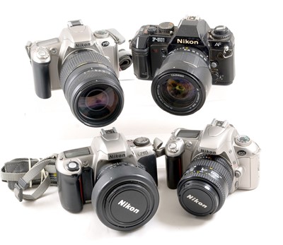 Lot 1049 - Four Nikon AF Film Cameras with Zoom Lenses.