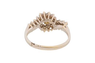 Lot 14 - A 14CT GOLD AND DIAMOND HALO RING, CIRCA 1969