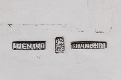 Lot 107 - An early 20th century Chinese export silver tea caddy, Canton circa 1920, marked Yi Sheng, retailed by Luen Wo