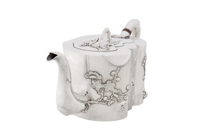 Lot 104 - An early 20th century Chinese export silver teapot, Canton and Shanghai circa 1910, marked An Chang, retailed by Hung Chong of Shanghai