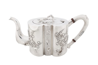 Lot 104 - An early 20th century Chinese export silver teapot, Canton and Shanghai circa 1910, marked An Chang, retailed by Hung Chong of Shanghai