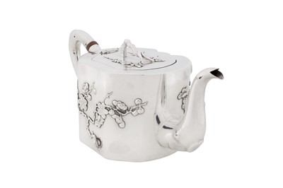 Lot 104 - An early 20th century Chinese export silver teapot, Canton and Shanghai circa 1910, marked An Chang, retailed by Hung Chong of Shanghai