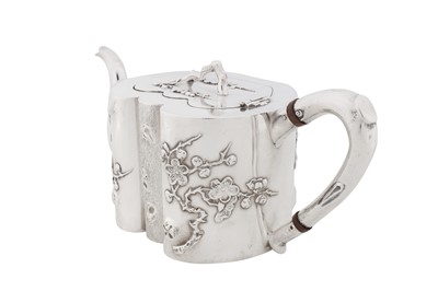 Lot 104 - An early 20th century Chinese export silver teapot, Canton and Shanghai circa 1910, marked An Chang, retailed by Hung Chong of Shanghai