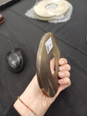Lot 524 - THREE CHINESE ARCHAISTIC JADE BI DISCS