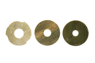 Lot 517 - THREE CHINESE ARCHAISTIC JADE BI DISCS