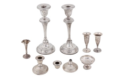 Lot 198 - A pair of George VI sterling silver candlesticks, Birmingham 1938 by W I Broadway and Co