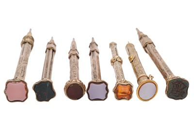 Lot 94 - A GROUP OF SEVEN VICTORIAN GILT METAL HARDSTONE SET PROPELLING PENCILS