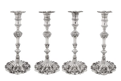 Lot 570 - A set of four George III sterling silver candlesticks, London 1765 by Ebenezeer Coker