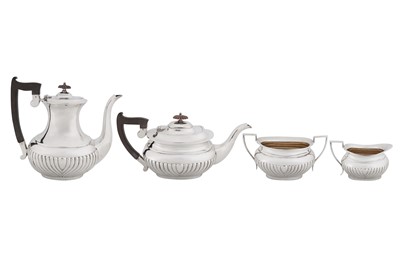 Lot A George V sterling silver four-piece tea and coffee service, Sheffield 1918 by Emile Viner