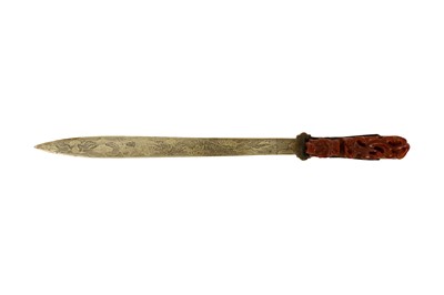 Lot 526 - A CHINESE LETTER OPENER MOUNTED WITH A JADE BELT HOOK