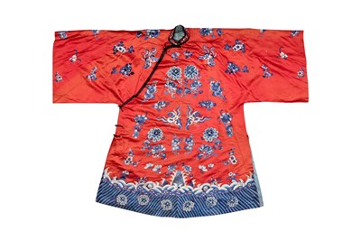 Lot 224 - A CHINESE SILK EMBROIDERED RED-GROUND ROBE