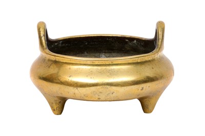 Lot 198 - A CHINESE POLISHED BRONZE TRIPOD CENSER