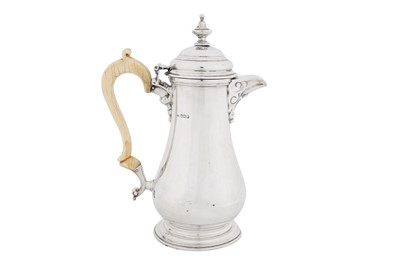 Lot 478 - A George V sterling silver hot water or coffee pot, Sheffield 1926 by Mappin and Webb