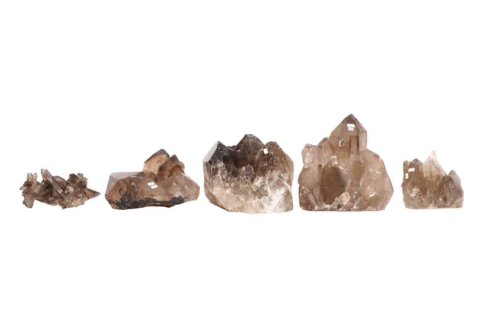 Lot 73 - A GROUP OF FIVE SMOKY QUARTZ CLUSTERS
