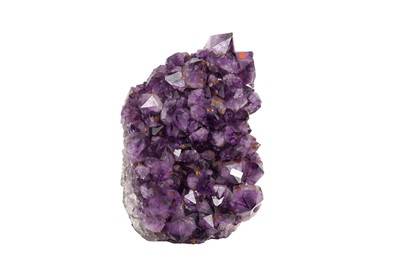 Lot 231 - AN AMETHYST GEODE CLUSTER WITH INCLUSIONS