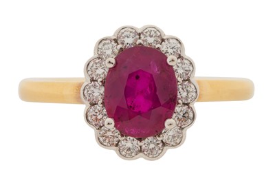 Lot 386 - A RUBY AND DIAMOND CLUSTER RING