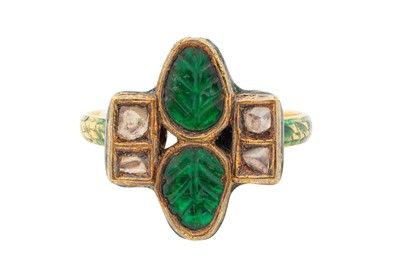 Lot 90 - A CARVED EMERALD AND POLKI DIAMOND RING