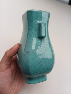 Lot 607 - A CHINESE ROBIN'S EGG-GLAZED TWIN-HANDLED VASE, HU