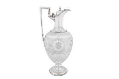 Lot A Victorian sterling silver wine ewer, London 1874 by Martin, Hall and Co