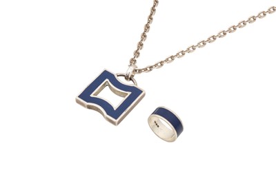 Lot 167 - Gucci Silver Gemini Pendant Necklace And Ring Set