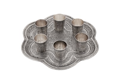 Lot An early 20th century Persian (Iranian) silver shots set on tray, Isfahan circa 1920 by Ja'far