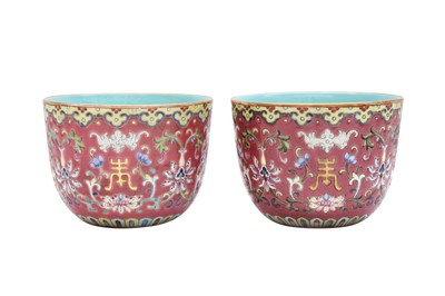 Lot 229 - A PAIR OF CHINESE FAMILLE-ROSE RUBY-GROUND TEA BOWLS