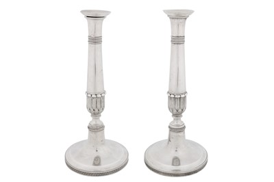 Lot A pair of early 19th century Austrian 13 loth (812 standard) silver candlesticks, Vienna 1810 or 1820 by Franz Lorenz Turinsky (active 1792-1828)